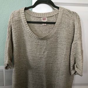 Woman’s short sleeved knit sweater